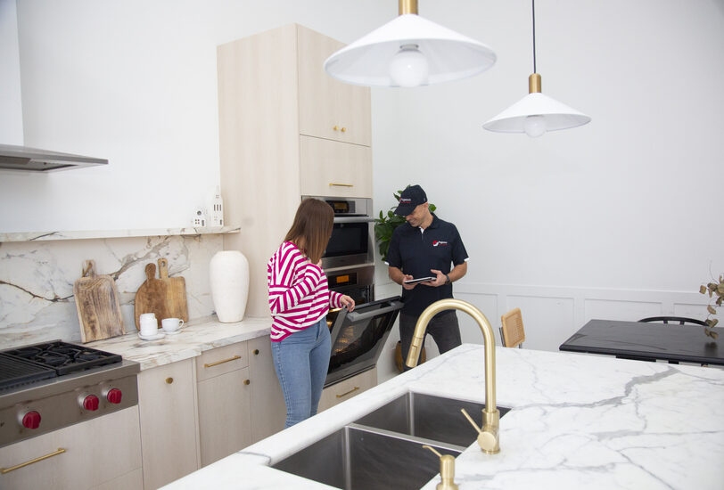 Pegasus Appliance Repair technician diagnosing a wall oven in Toronto