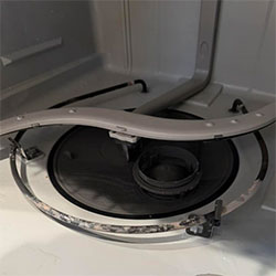 Severe limescale buildup on dishwasher heating element in Ancaster