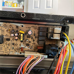 Damaged appliance control board from electrical surge