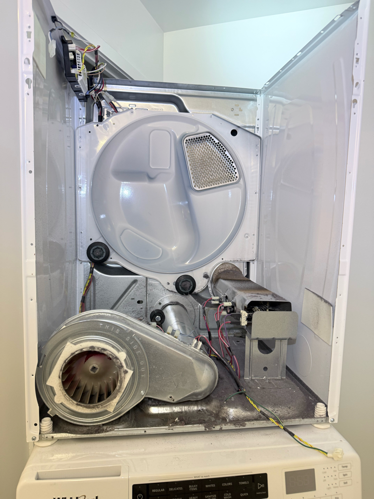 Whirlpool dryer disassembled for blower motor diagnosis